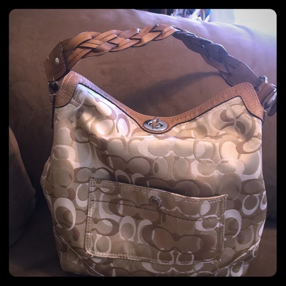 Coach purse. Zero stains or wear. Tan and brown.